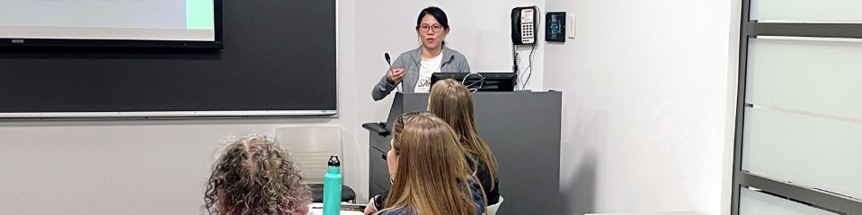 Graduate students listening to a presentation at the GSWS Colloquium in 2023