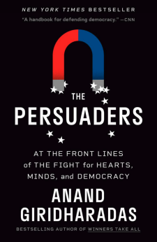 The book cover for The Persuaders: At the Front Lines of the Fight for Hearts, Minds, and Democracy by Anand Giard. The title and author are written in white letters against a black background, with an image of a magnet with red and blue opposite ends toward the top of the book cover.