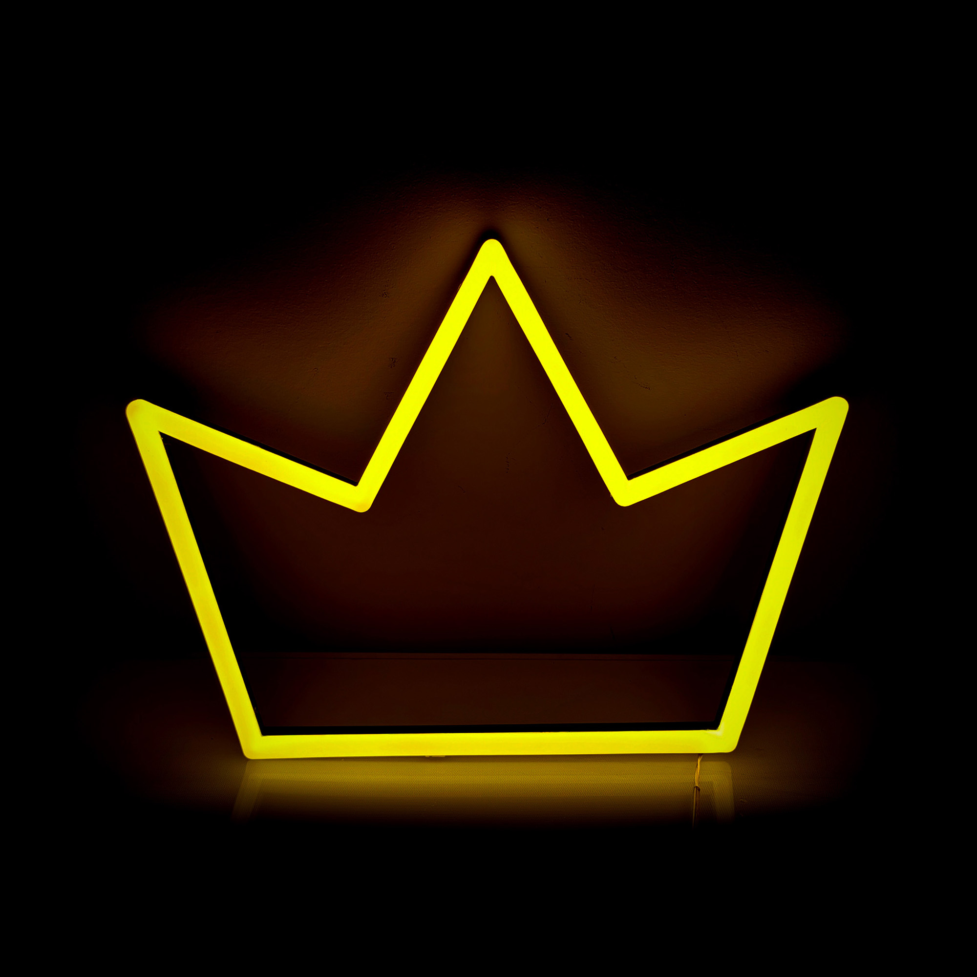 Yellow eon sign of a crown