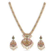Dark gold jhumka earrings with a medallion-style necklace