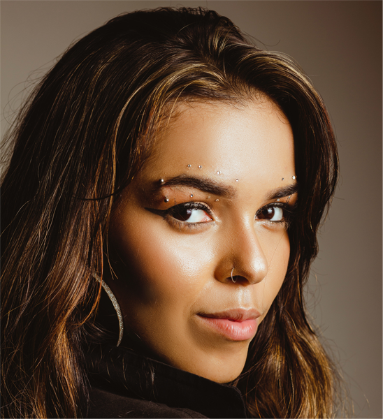 An image of a woman with brown hair