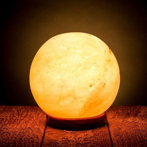 an orb-shaped bedside lamp