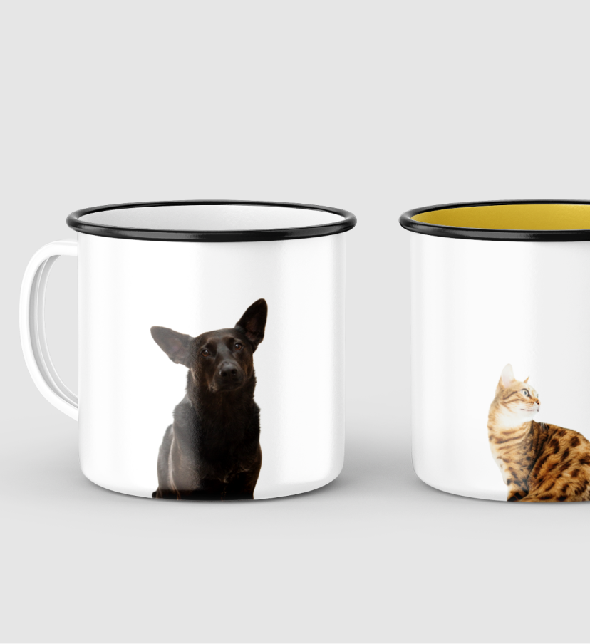 Two enamel cups with dog and cat printed.