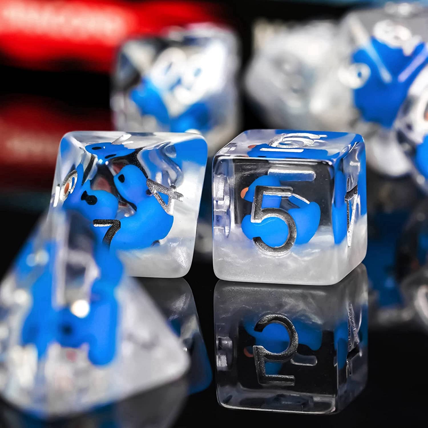 7 duck dice on a black surface