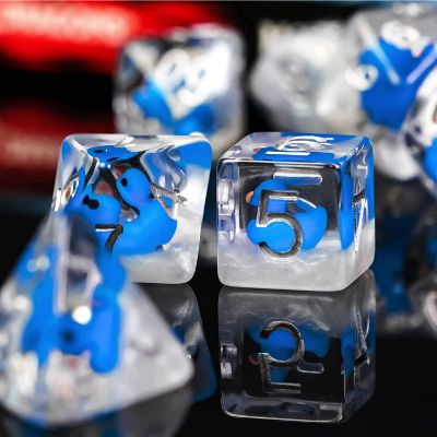 7 duck dice on a black surface