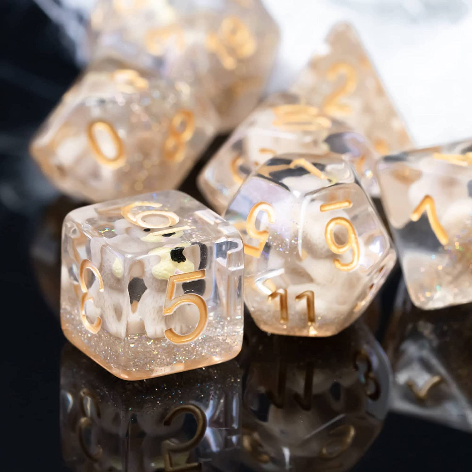 Various dog dice on a black surface