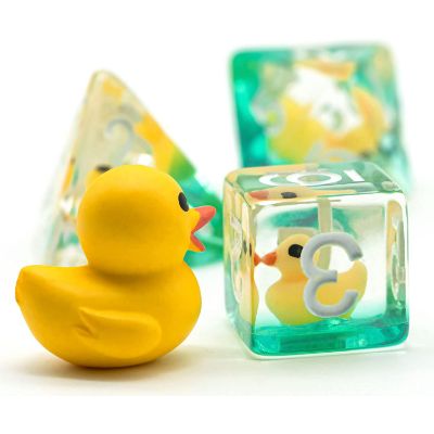 Translucent resin dice with yellow ducks inside