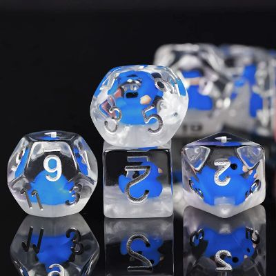 Translucent resin dice with blue ducks inside