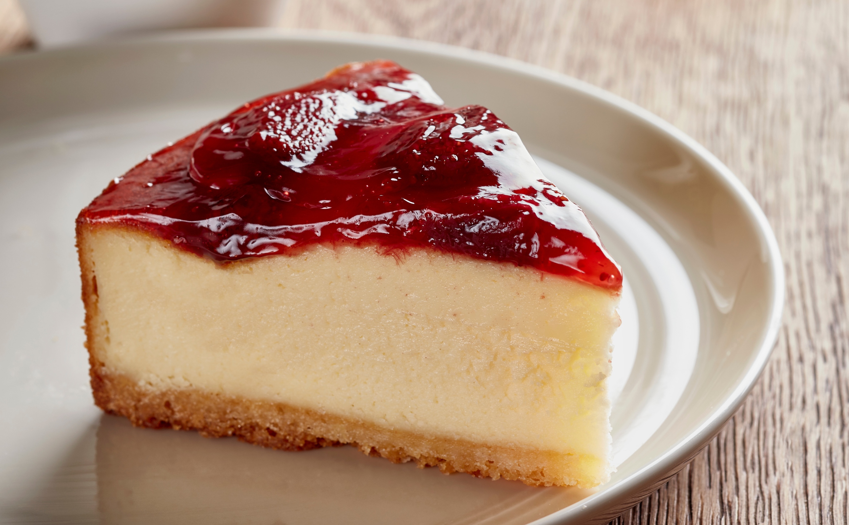 A piece of cheesecake on a plate.