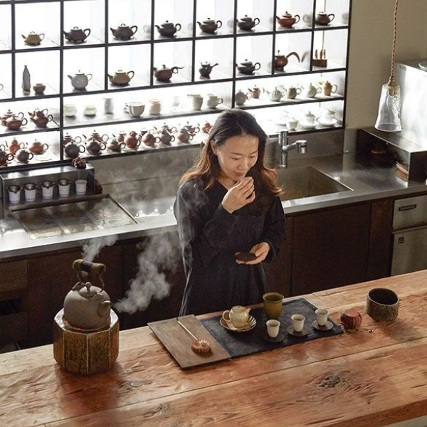 photo of woman conducting tea class