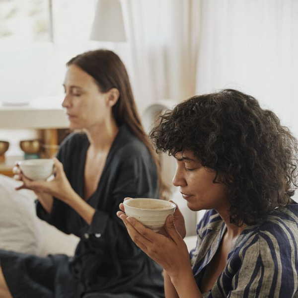 photo of people holding tea cups