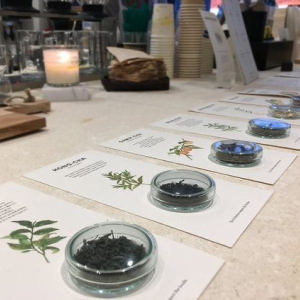 photo of labels and glass plates of tea leaves