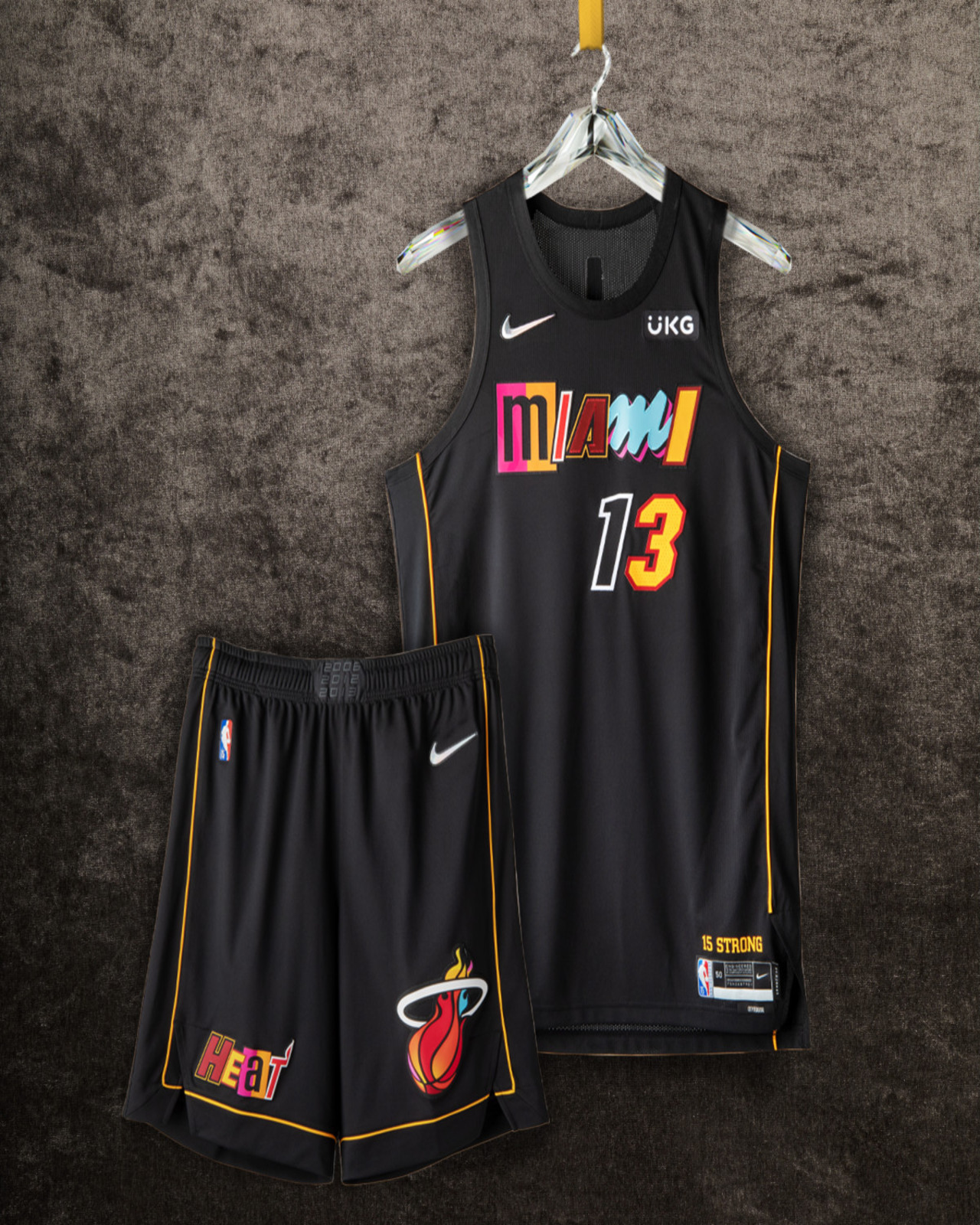 Miami Heat black jersey, shorts on grey. Link to product page.