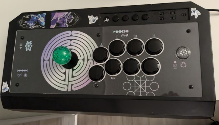 Black arcade stick with custom print.