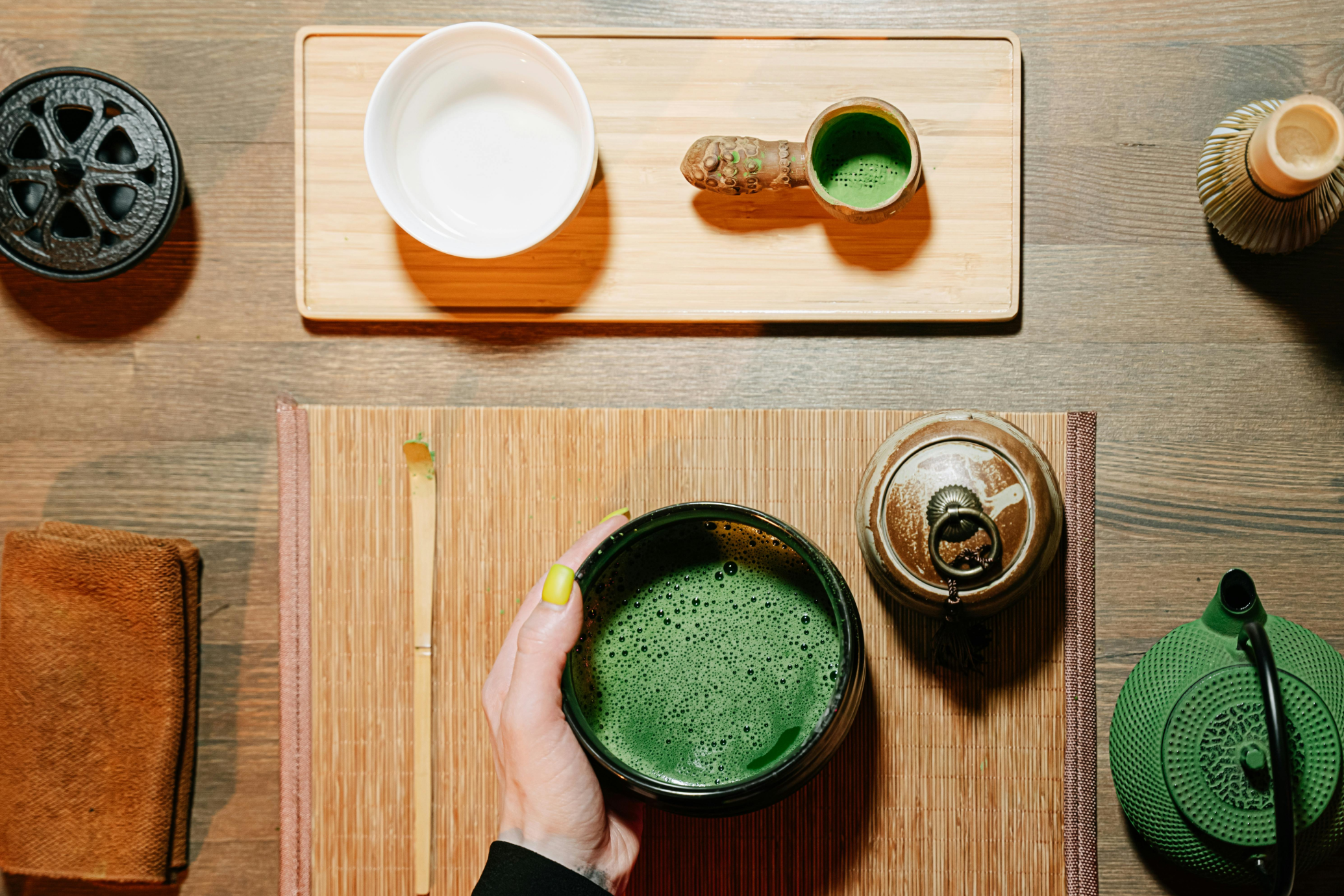 Traditional desk with whisked matcha in bowl