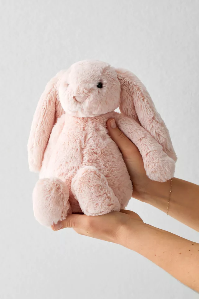 holding pinky bunny image