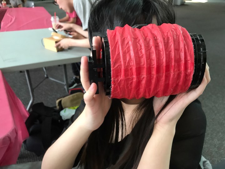 A lantern shaped virtual reality head-mounted display made with paper and plastic