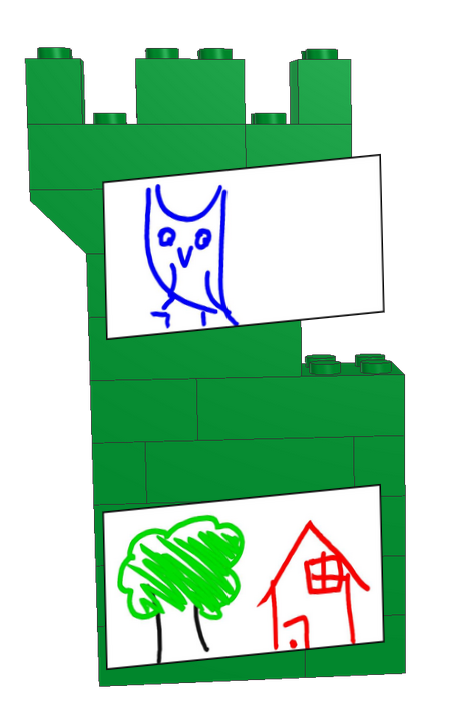 A castle block tower with two drawings stuck on the front: an owl (top) and a simple, colourful drawing of a tree and a house (bottom).