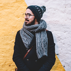 Image of a young man wearing a beanie